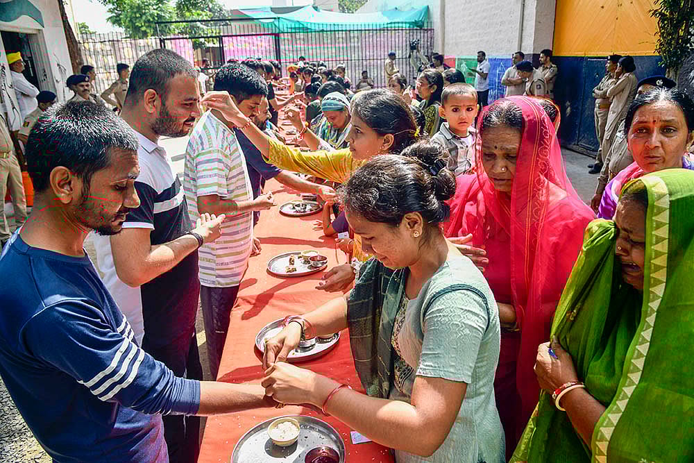 | Photo: PTI : Raksha Bandhan celebration in Rajkot Central Jail